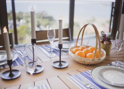 Elegant table setup in a dining area with a scenic view