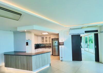 Modern kitchen with island and stainless steel appliances