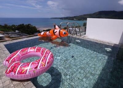 Outdoor swimming pool with ocean view