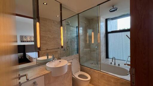 Modern bathroom with glass shower and bathtub