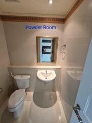 Powder room with toilet and wash basin