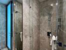 Modern bathroom with glass shower walls