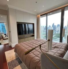 Modern bedroom with large window and city view