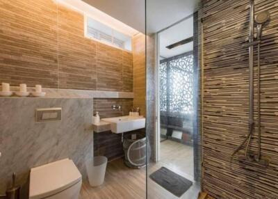 Modern bathroom with glass shower and sink