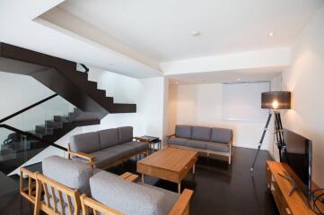 Modern living room with staircase