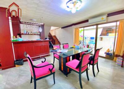 Dining area with modern furniture and a bar counter