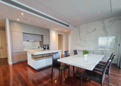 Modern dining area with kitchen view