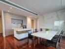 Modern dining area with kitchen view