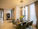 Modern dining room with a stylish chandelier and city view