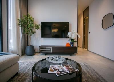 Modern living room with a TV and coffee table