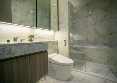 Modern bathroom with marble surfaces