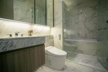 Modern bathroom with marble surfaces