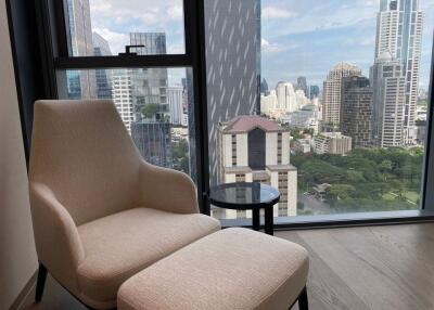 Modern living room with chair and stunning city view