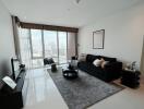 Spacious living room with modern furnishings and city view