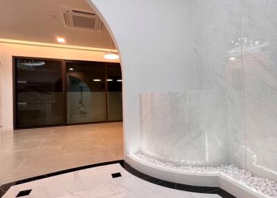 building corridor with modern white marble tiles and arch design