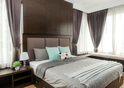 Modern bedroom with a large bed and stylish decor