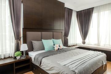 Modern bedroom with a large bed and stylish decor