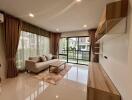 Living room with large window and modern furniture