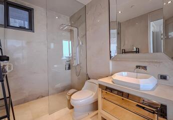 Modern bathroom with glass shower and sink