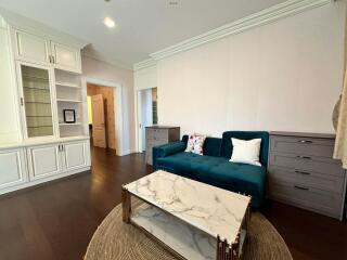 Living room with modern furniture and storage units