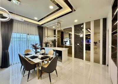 Modern dining area with table and chairs