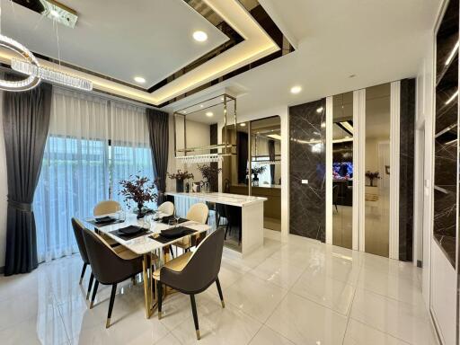 Modern dining area with table and chairs