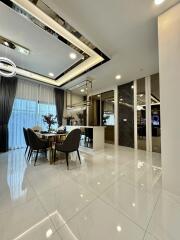 Modern dining area with elegant decor and ample lighting