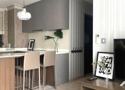 Modern kitchen with a small dining area