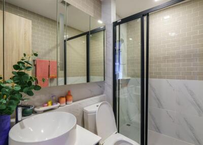 Modern bathroom with glass shower and vanity