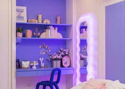 Cozy bedroom with blue-themed decor and built-in shelves