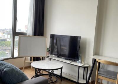 Modern living room with a TV and coffee table