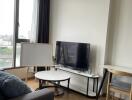 Modern living room with a TV and coffee table