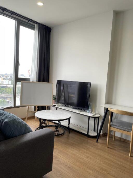 Modern living room with a TV and coffee table