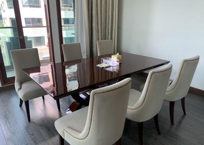 Dining room with modern furniture and large window