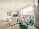 Modern living room with dining area and large windows