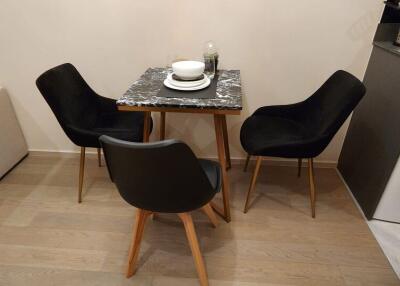 cozy dining area with table and chairs