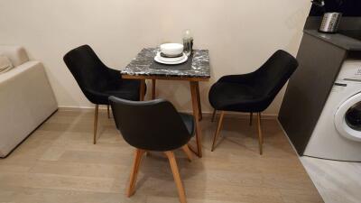 cozy dining area with table and chairs