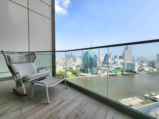 Balcony with a view of the city and river