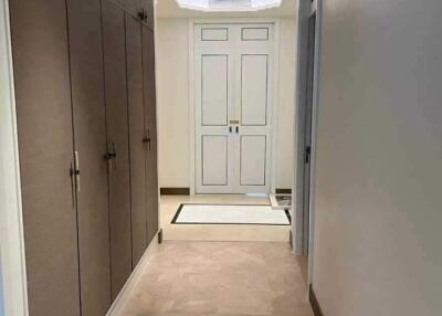 Hallway with storage cabinets