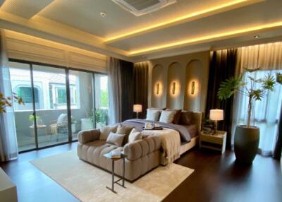 Luxurious bedroom with modern décor and balcony access