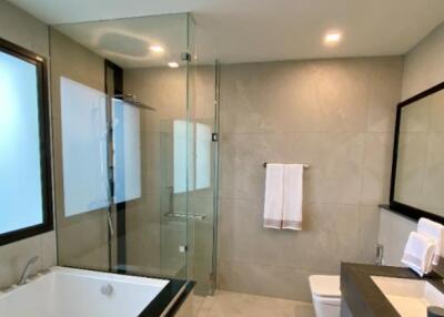 Modern bathroom with bathtub and shower