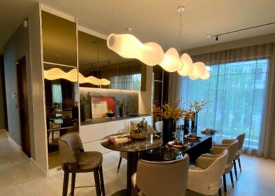 Modern dining room with elegant lighting and decor