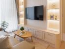 modern living room with wall-mounted TV and built-in shelves