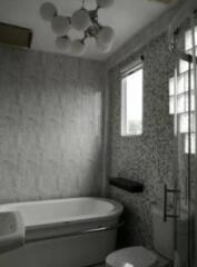 Bathroom with bathtub and modern fixtures