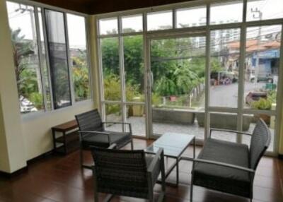 Enclosed patio with seating area