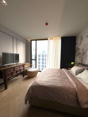 Modern bedroom with large window and balcony view