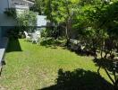 Beautiful garden with outdoor furniture and greenery