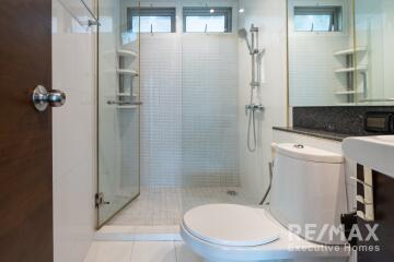 Modern bathroom with glass shower and toilet