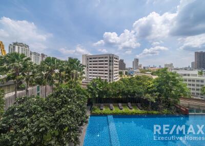 View of a pool in an urban apartment complex