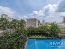 View of a pool in an urban apartment complex